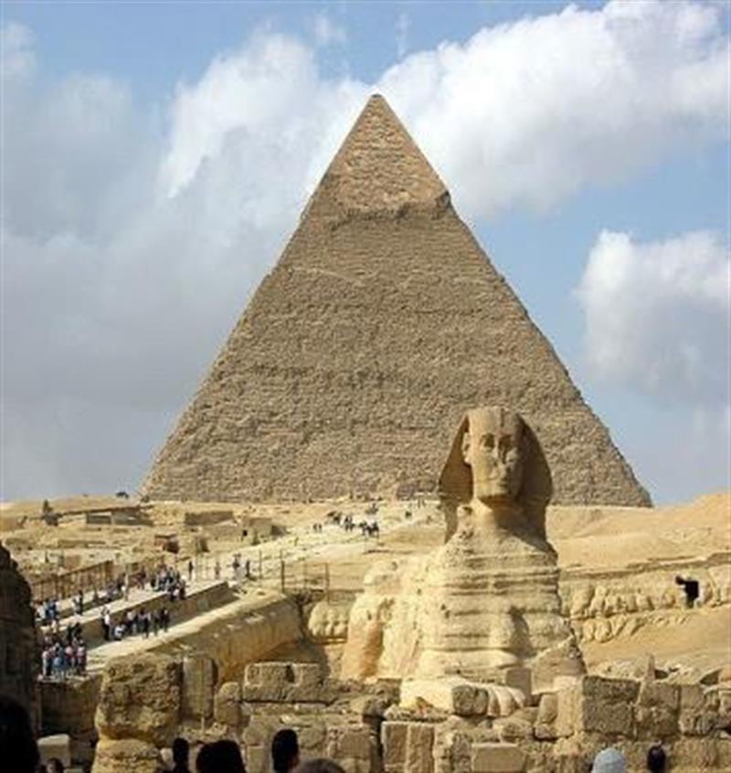 image of the Egyptian sphynx with a pyramid in the background